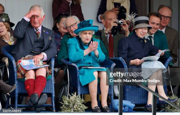 Prince Charles, Prince of Wales, Queen Elizabeth II and Princess Anne, Princess Royal attend the 2018 Braemar Highland Gathering at The Princess...