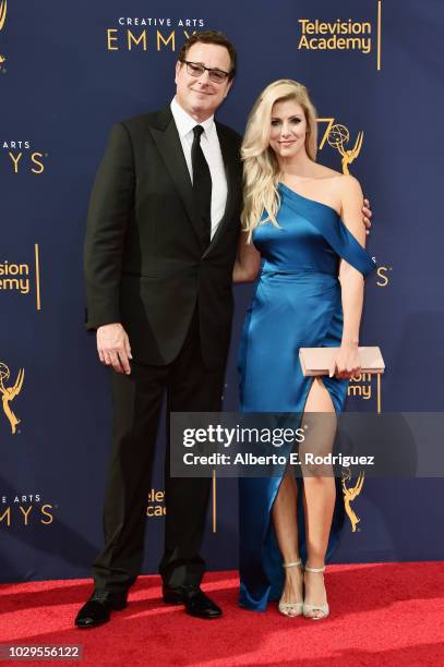 Actor Bob Saget and Kelly Rizzo attend the 2018 Creative Arts Emmy Awards at Microsoft Theater on September 8, 2018 in Los Angeles, California.