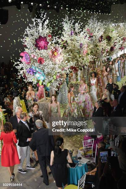 Designers Mark Badgley and James Mischka walk the runway at the Badgley Mischka show in gallery I during New York Fashion Week: The Shows on...