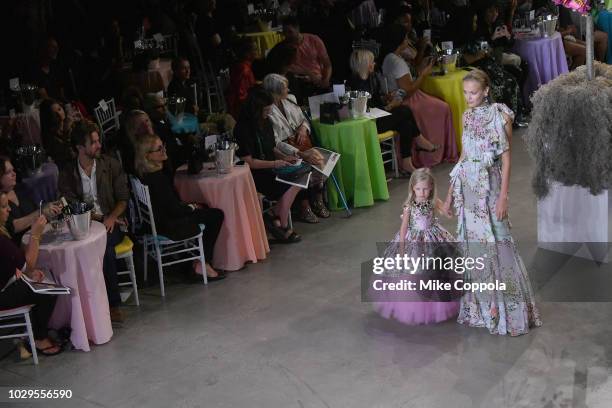 Models walk the runway at the Badgley Mischka show in gallery I during New York Fashion Week: The Shows on September 8, 2018 in New York City.