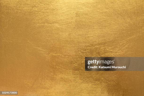 golden foil paper texture background - livello di superficie foto e immagini stock