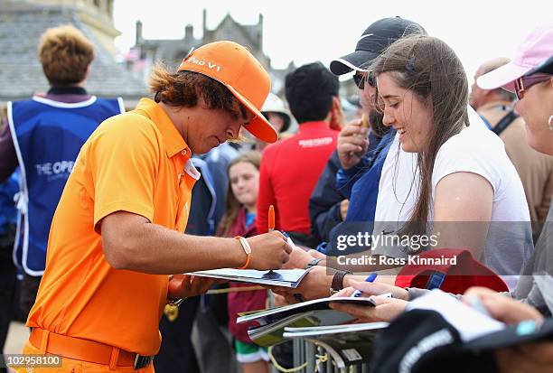 Rickie Fowler of the USA signs autographs for fans during the final round of the 139th Open Championship on the Old Course, St Andrews on July 18,...