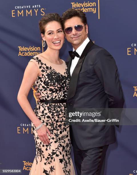 John Stamos and Caitlin McHugh attend the 2018 Creative Arts Emmy Awards at Microsoft Theater on September 8, 2018 in Los Angeles, California.