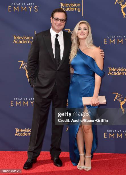 Bob Saget and Kelly Rizzo attend the 2018 Creative Arts Emmy Awards at Microsoft Theater on September 8, 2018 in Los Angeles, California.