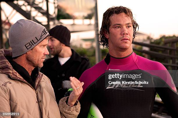 Jordy Smith of South Africa chats to Contest Director Mike Parsons during the Billabong Pro Jeffreys Bay on July 18, 2010 in Jeffreys Bay, South...