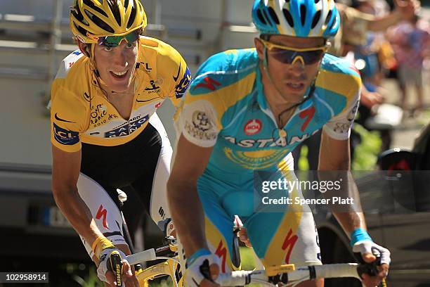 Luxembourg's Andy Schleck, in the yellow jersey, chases Spain�s Alberto Contador on the final climb of Stage 14 of the Tour de France, the first...