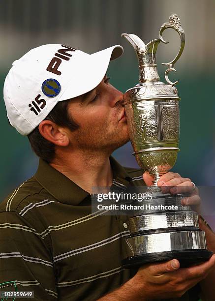 Louis Oosthuizen of South Africa kisses the Claret Jug after his seven-stroke victory at the 139th Open Championship on the Old Course, St Andrews on...
