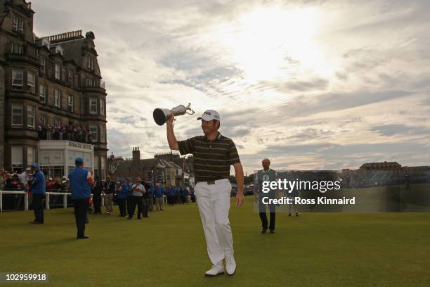Louis Oosthuizen of South Africa parades the Claret Jug after his seven-stroke victory at the 139th Open Championship on the Old Course, St Andrews...