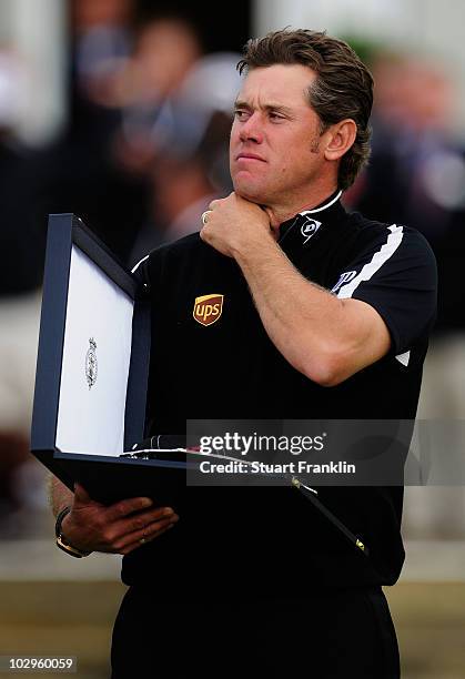 Lee Westwood of England holds the silver salver at the awards presentation at the 139th Open Championship on the Old Course, St Andrews on July 18,...