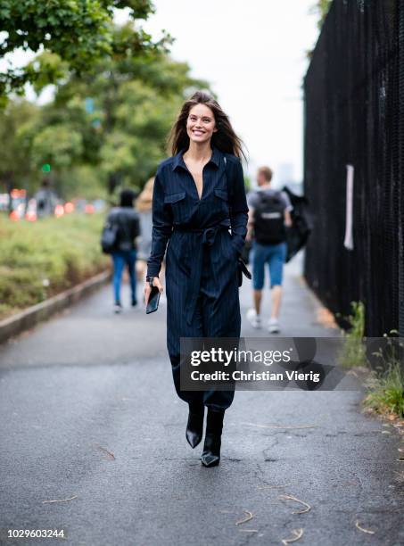 Model Emily DiDonato wearing navy striped overall seen outside Brandon Maxwell during New York Fashion Week Spring/Summer 2019 on September 8, 2018...
