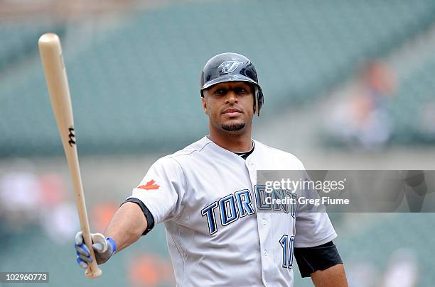 Vernon Wells of the Toronto Blue Jays tosses his bat after striking out against the Baltimore Orioles at Camden Yards on July 18, 2010 in Baltimore,...