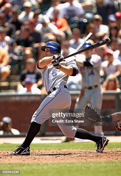 David Wright of the New York Mets hits a home run to give the Mets a 2-1 lead in the fourth inning of their game against the San Francisco Giants at...