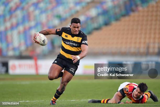 Seta Tamanivalu of Taranaki runs through to score a try during the round four Mitre 10 Cup Ranfurly Shield match between Taranaki and Waikato at...