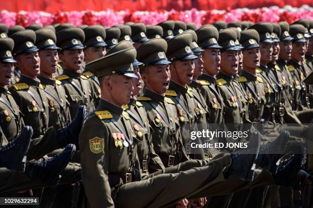 Korean People's Army soldiers march during a mass rally on Kim Il Sung square in Pyongyang on September 9, 2018. - North Korea was marking the 70th...