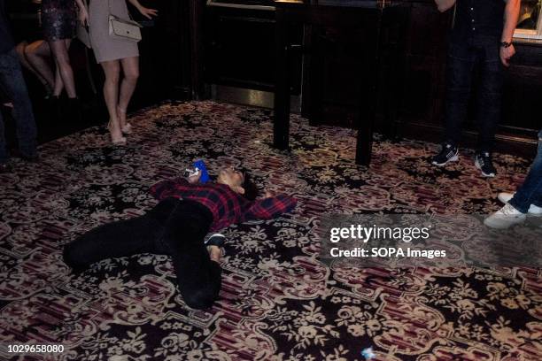 Local teenager seen dancing at a night-out on a weekend in Leeds city center. Leeds is the largest city in the northern English county of Yorkshire.