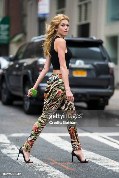 Katherine McNamara is seen wearing a Wilfred top, Adriana Iglesias pants and Yves Saint Laurent shoes in Murray Hill on September 8, 2018 in New York...