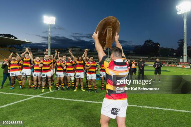 Captain Dwayne Sweeney of Waikato lifts the Ranfurly Shield after the win in the round four Mitre 10 Cup Ranfurly Shield match between Taranaki and...