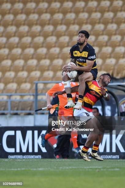 Regan Ware of Taranaki and Sevu Reece of Waikato compete for the ball during the round four Mitre 10 Cup Ranfurly Shield match between Taranaki and...