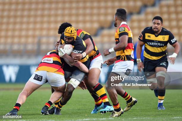 Pita Sowakula of Taranaki is tackled during the round four Mitre 10 Cup Ranfurly Shield match between Taranaki and Waikato at Yarrow Stadium on...