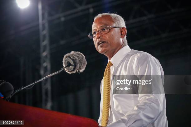 In this picture taken on September 8 Maldives' main opposition leader and presidential candidate Ibrahim Mohamed Solih addresses a crowd during a...