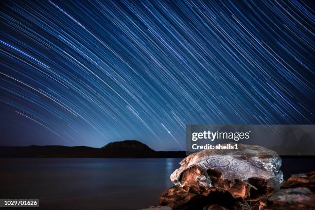 stingray rock star trail. - star trail stock pictures, royalty-free photos & images