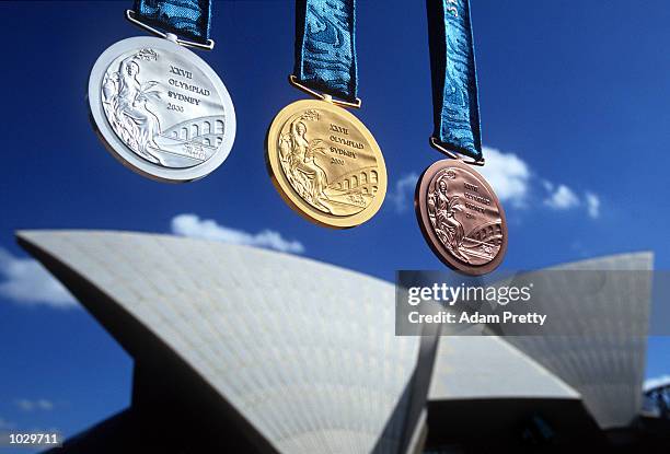 The medals for the 2000 Sydney Olympic Games are unveiled during a press conference at the Sydney Opera House in Sydney, Australia. Mandatory Credit:...