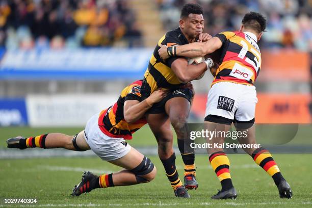 Seta Tamanivalu of Taranaki is tackled during the round four Mitre 10 Cup Ranfurly Shield match between Taranaki and Waikato at Yarrow Stadium on...