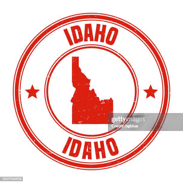 idaho - red grunge rubber stamp with name and map - idaho stock illustrations