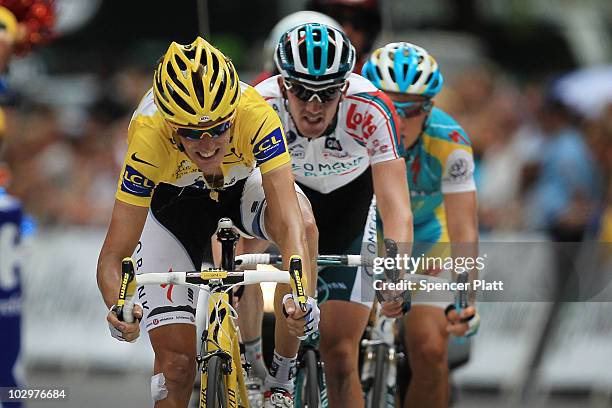 Luxembourg's Andy Schleck crosses the finish line after losing the yellow jersey to Spaniard Alberto Contador at the end of stage 15 of the Tour de...