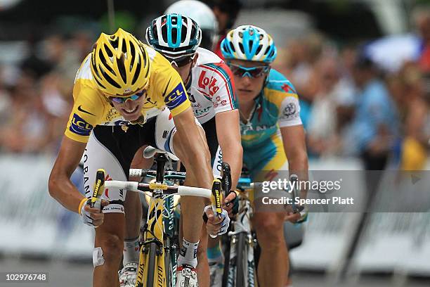 Luxembourg's Andy Schleck crosses the finish line after losing the yellow jersey to Spaniard Alberto Contador at the end of stage 15 of the Tour de...