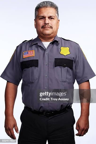 portrait of security guard wearing uniform - american flag on stand stock pictures, royalty-free photos & images