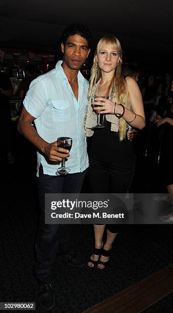 Carlos Acosta and Charlotte Holland attend the UK Premiere of 'South Of The Border' at The Curzon Mayfair on July 19, 2010 in London, England.