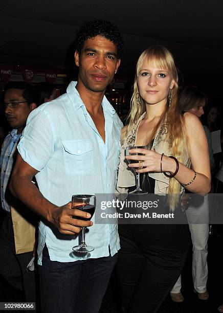 Carlos Acosta and Charlotte Holland attend the UK Premiere of 'South Of The Border' at The Curzon Mayfair on July 19, 2010 in London, England.