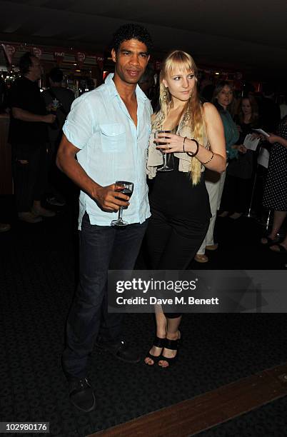 Carlos Acosta and Charlotte Holland attend the UK Premiere of 'South Of The Border' at The Curzon Mayfair on July 19, 2010 in London, England.