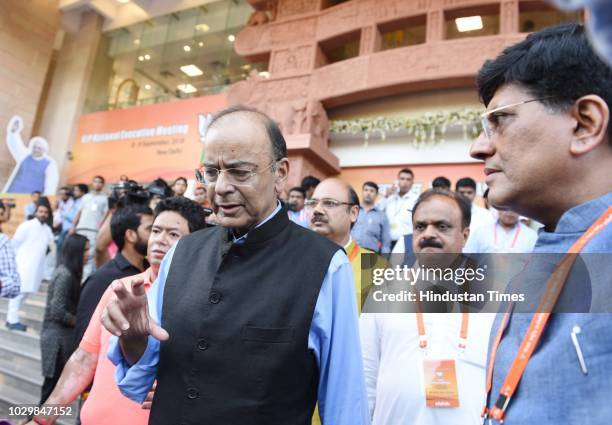 Union Finance Minister Arun Jaitley and Railways Minister Piyush Goyal leave after BJP National Executive Meeting at Ambedkar Bhawan, on September 9,...