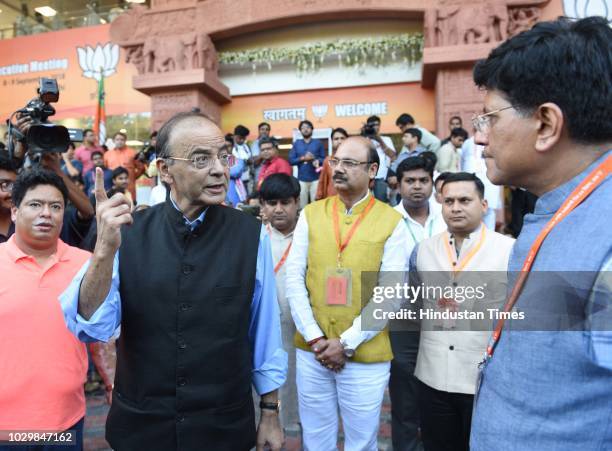 Union Finance Minister Arun Jaitley and Railways Minister Piyush Goyal leave after BJP National Executive Meeting at Ambedkar Bhawan, on September 9,...