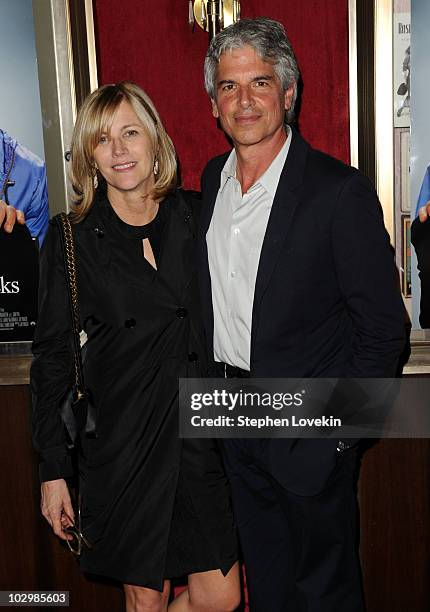 Producers Laurie MacDonald and Walter F. Parkes attend the "Dinner For Schmucks" premiere at the Ziegfeld Theatre on July 19, 2010 in New York City.