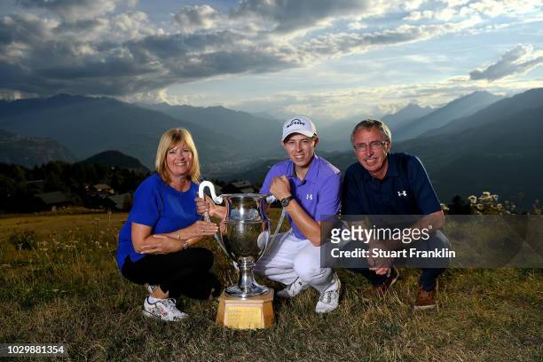 Matthew Fitzpatrick of England and his parents Russell Fitzpatrick and Susan Fitzpatrick celebrate with the trophy after winning The Omega European...