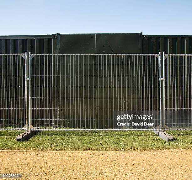 security fence - music festival grass stock pictures, royalty-free photos & images