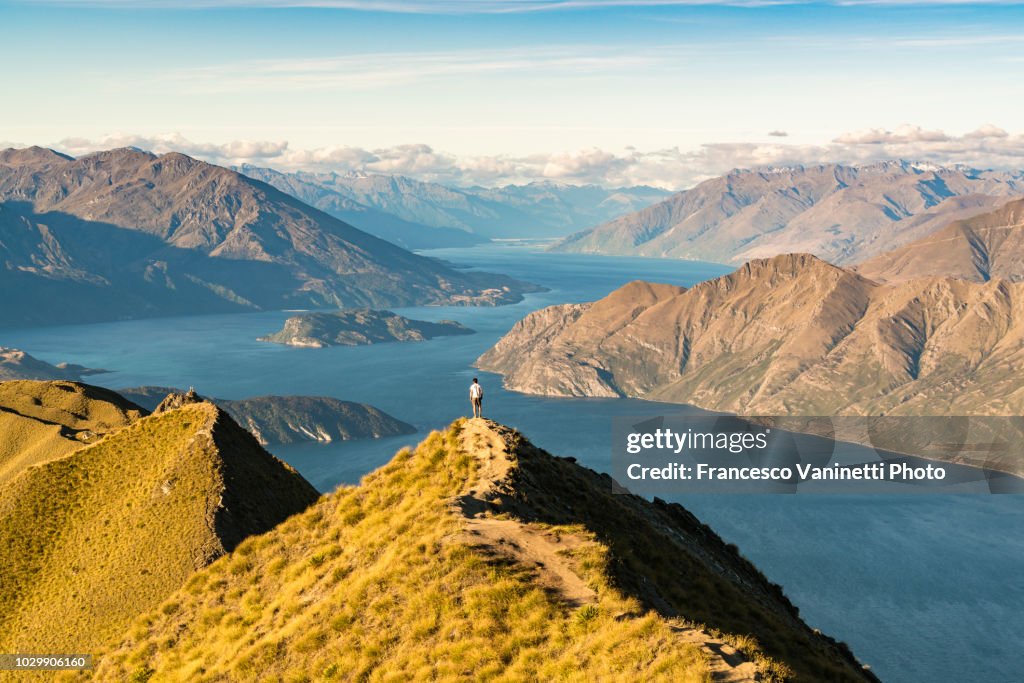 Man on Roys Peak, Wanaka, New Zealand.