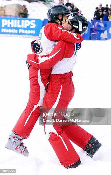 Jacqui Cooper and Alisa Camplin from Australia, celebrate after finishing first and second, in the second round of the World Cup season, during the...