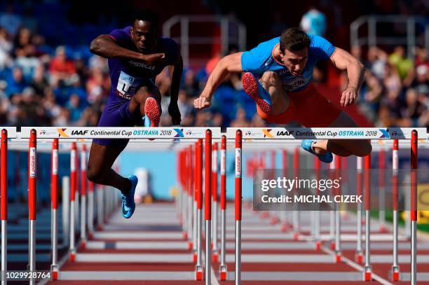 Sergey Shubenkov of Authorized neutral athlete from Team Europe and Ronald Levy of Jamaica from Team Americas compete during the 110m Hurdles Men...