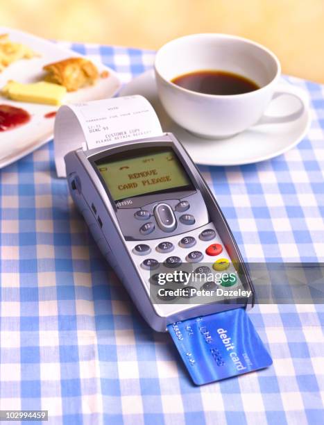 chip and pin machine on cafe table cloth  - checkered table cloth stock pictures, royalty-free photos & images