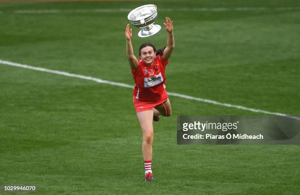 Dublin , Ireland - 9 September 2018; Hannah Looney of Cork celebrates with the O'Duffy Cup after the Liberty Insurance All-Ireland Senior Camogie...