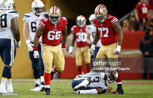 Will Sutton of the San Francisco 49ers celebrates after sacking Geno Smith of the Los Angeles Chargers during the game at Levi Stadium on August 30,...