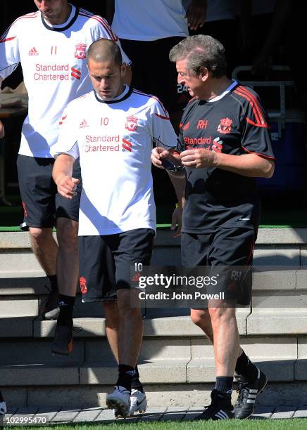 Liverppol FC new signing Joe Cole with Liverpool head coach Roy Hodgson during a training session at the club's pre-season Swiss Training Camp on...