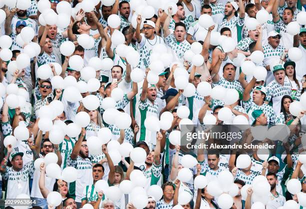 Fans of Palmeiras cheer during the match against Corinthians for the Brasileirao Series A 2018 at Allianz Parque Stadium on September 09, 2018 in Sao...