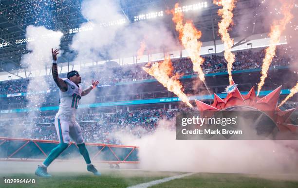 Kenny Stills of the Miami Dolphins is introduced before the game between the Miami Dolphins and the Tennessee Titans at Hard Rock Stadium on...