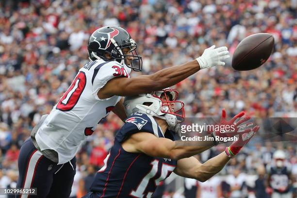 Kevin Johnson of the Houston Texans deflects a pass intended for Chris Hogan of the New England Patriots during the second half at Gillette Stadium...