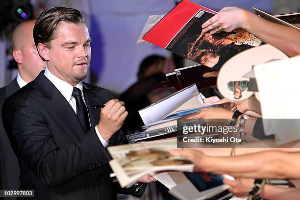 Actor Leonardo DiCaprio signs autographs for fans during the 'Inception' Japan Premiere at Roppongi Hills on July 20, 2010 in Tokyo, Japan. The film...
